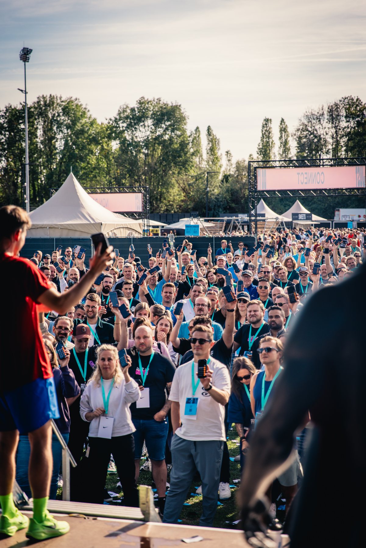 Jonas De Bruyn performing for a large audience at an international NIKE brand event